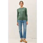 Women's sage crew neck knit sweater with long sleeves, ribbed hem and cuffs, and a relaxed fit