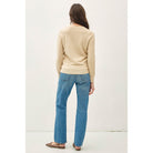 Women's sage crew neck knit sweater with long sleeves, ribbed hem and cuffs, and a relaxed fit
