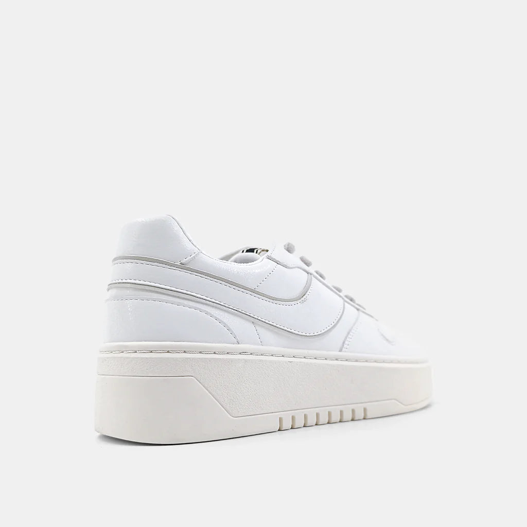 Satine Sneaker White. Modern take on classic basketball shoe, these sneakers are crafted from high-quality synthetic leather and feature stacked rubber soles that offer both comfort and style.