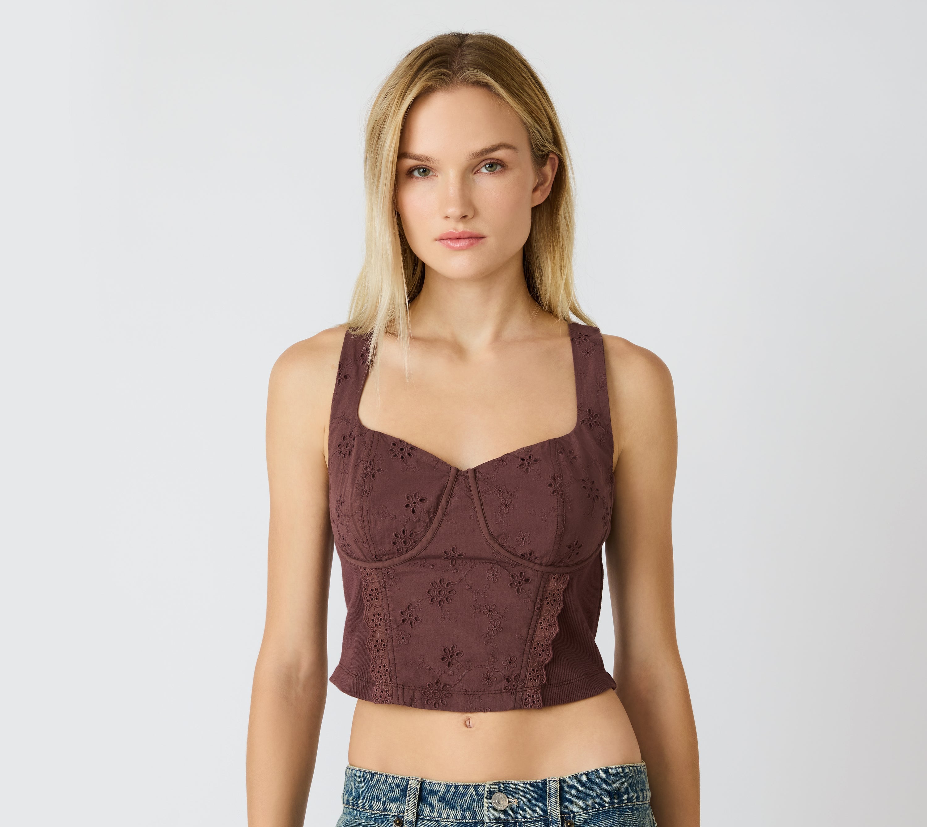 eyelet corset top women, bustier style top, structured cropped top, feminine eyelet tank, corset inspired top, romantic fitted top, boutique fashion crop top, structured summer top women, trendy corset tank, modern feminine top, elevated casual crop top, fashion forward eyelet top