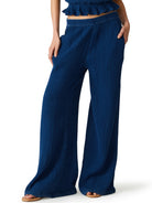 Wide-leg textured pull-on pants with relaxed fit on model