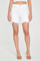 Daze Sundaze Short Ivory. Take it easy like Sunday morning in this mid thigh length short featuring a distressed hem, and mixed metal hardware. Constructed in a bright white shade, the denim is mostly rigid, but with a touch of stretch.