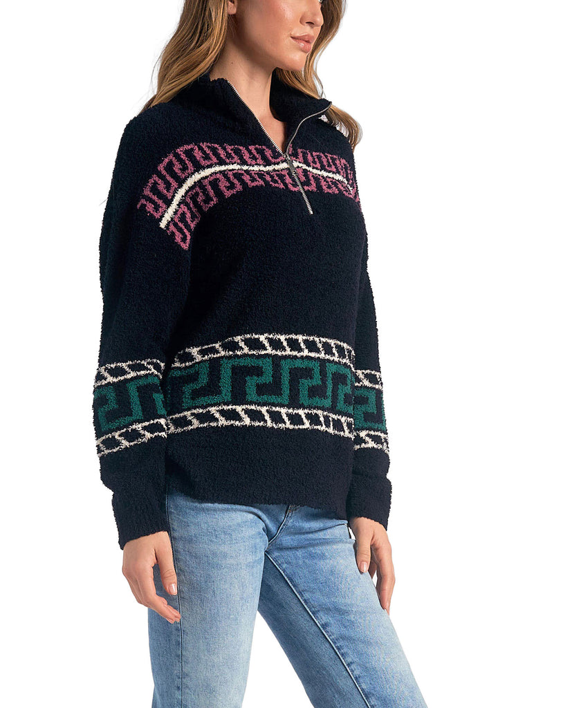 Elan Collar Zipper Sweater Multi Black. This cozy zip front sweater is made from the softest material, with a subtle pop of color that makes it perfect for wearing everyday this winter.