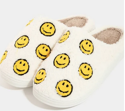 Stay cozy, stylish, and happy with these Multi Yellow Smiley Face Slippers from Whim! Perfect for weekends with the fam or working from home.