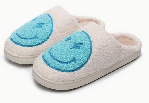 Bolt Eyes Smiley Face Slippers Blue. Stay cozy, stylish, and happy with these Lightning bolt Eyes Smiley Face Slippers from Whim! Perfect for weekends with the fam or working from home.
