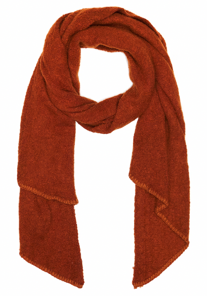 Free People Rangeley Scarf Gingerbread. This textured bouclé scarf bundles you up in a fashion-forward look finished with blanket-stitched edges, sure to keep you warm this winter.