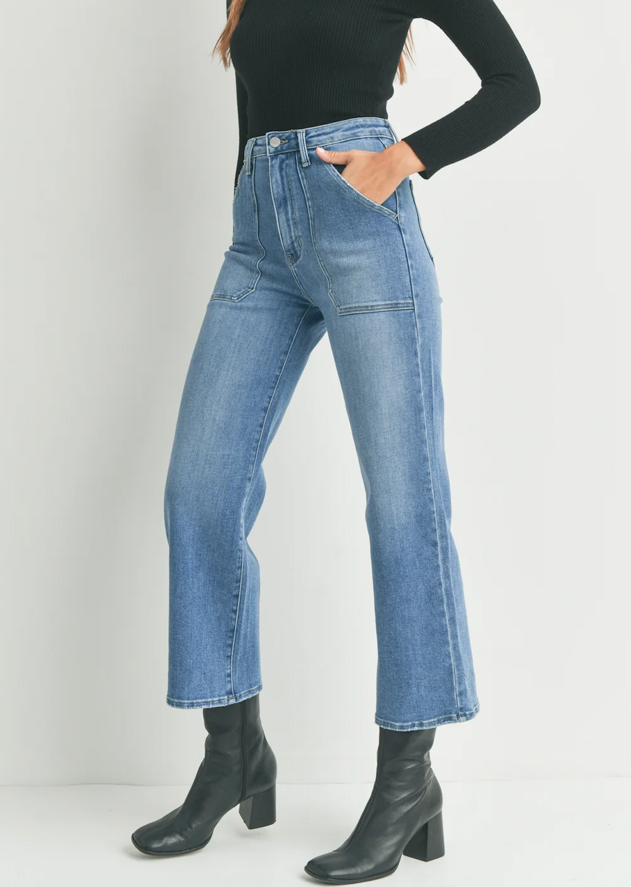 JBD Cargo Pocket Wide Leg Medium Blue Denim. Contemporary styles with 70s vibes combine to create the most comfortable, figure-flattering jeans. These wide-leg jeans feature patch pockets and a zip front closure for an all-out vintage inspired look.
