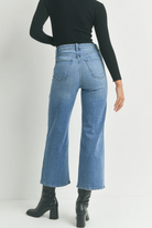JBD Cargo Pocket Wide Leg Medium Blue Denim. Contemporary styles with 70s vibes combine to create the most comfortable, figure-flattering jeans. These wide-leg jeans feature patch pockets and a zip front closure for an all-out vintage inspired look.