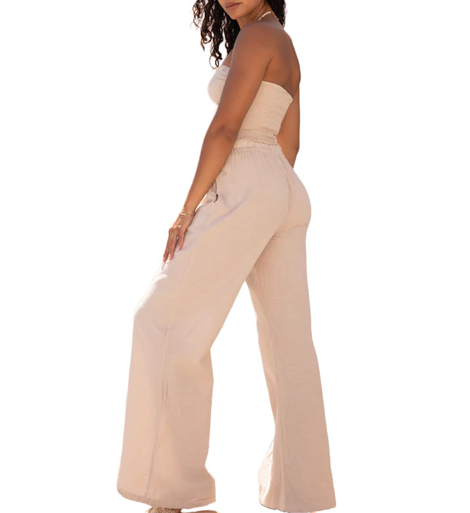Grenada Flowy Pant Beige. Designed from a high quality cotton fabric, these flowy pants feature an elastic waist and allow you to wear them styled low or high waisted for any type of look.