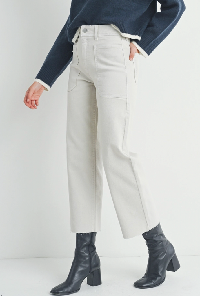 JBD Utility Wide Leg White. Wide leg jeans are everywhere, shouldn’t they be in your closet? Get with the times and make a statement in these wide leg Jeans. Bonus: big, roomy pockets that fit your phone and add just the right amount of drama.