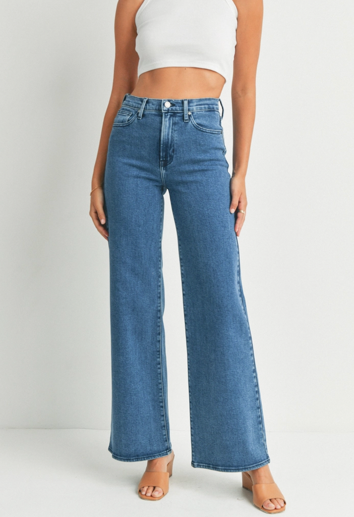 JBD Palazzo Jean Medium Blue Denim. These high rise jeans feature a wide straight leg and medium blue wash, the perfect comfortable pair for wearing everyday with your fav top.