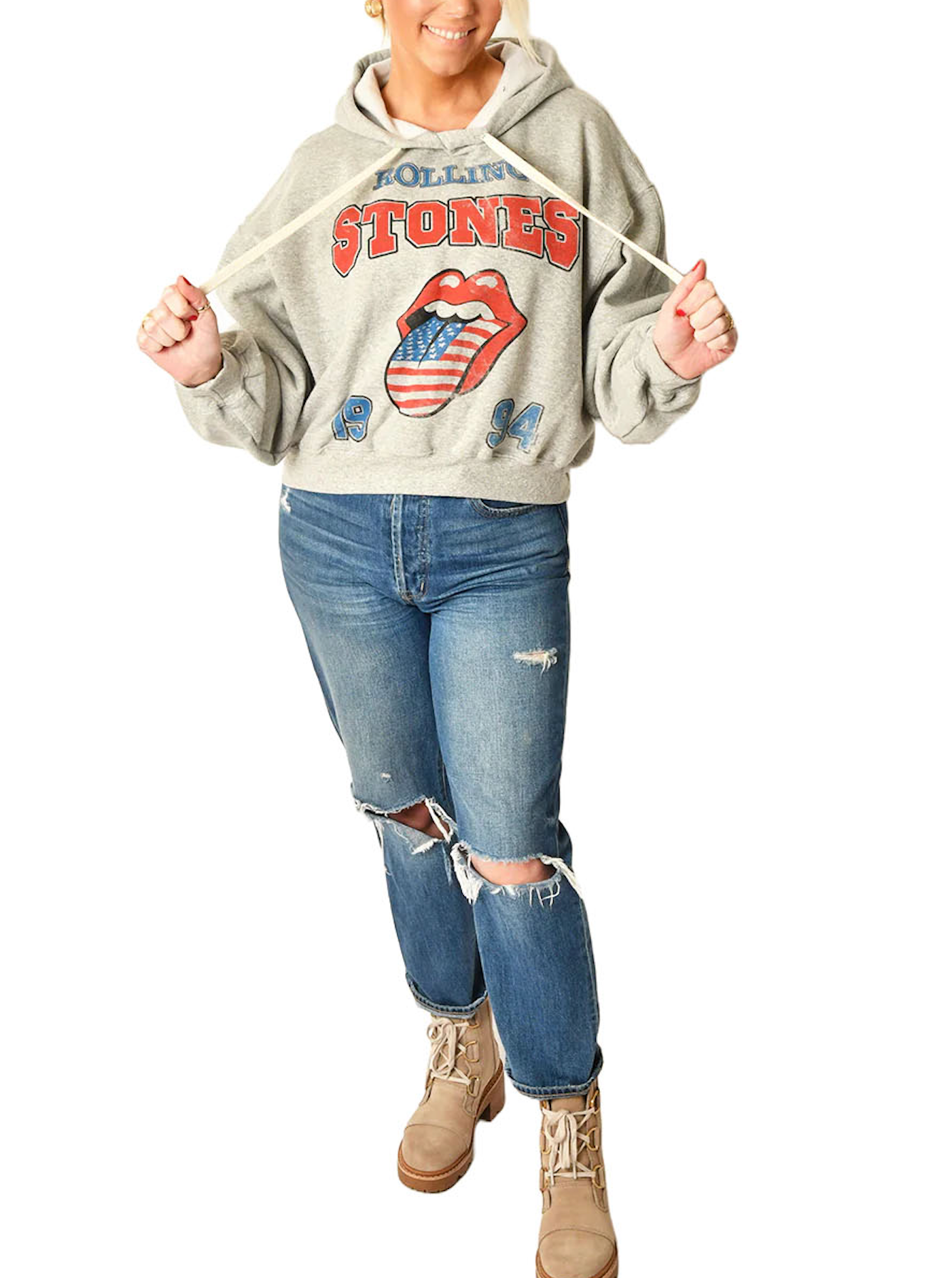 Rolling Stones Hoodie Heather Grey. Embrace the spirit of rock history with The Rolling Stones USA 1994 Hoodie. This hoodie provides cozy comfort while making a sustainable statement. It's a classic yet forward-thinking addition to any collection, offering warmth for the cool moments and a salute to timeless tunes.