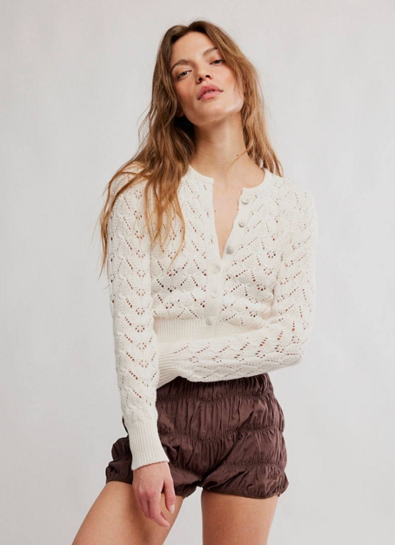 pointelle cardigan, knit cardigan, lightweight sweater, fitted cardigan, feminine knit top, button front sweater, boutique cardigan, layering sweater, everyday knitwear, chic cardigan, trendy knit top, soft knit sweater, elevated basics, womens boutique fashion, versatile sweater top, modern feminine style