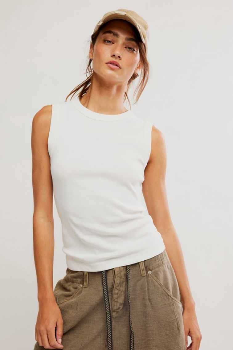 sleeveless knit tank, fitted tank top, elevated basics, minimalist tank, high neck tank, layering essential top, sleek sleeveless top, everyday wardrobe staple, chic boutique basics, modern fitted tank, womens boutique fashion, versatile layering top, casual chic tank, essential knit top