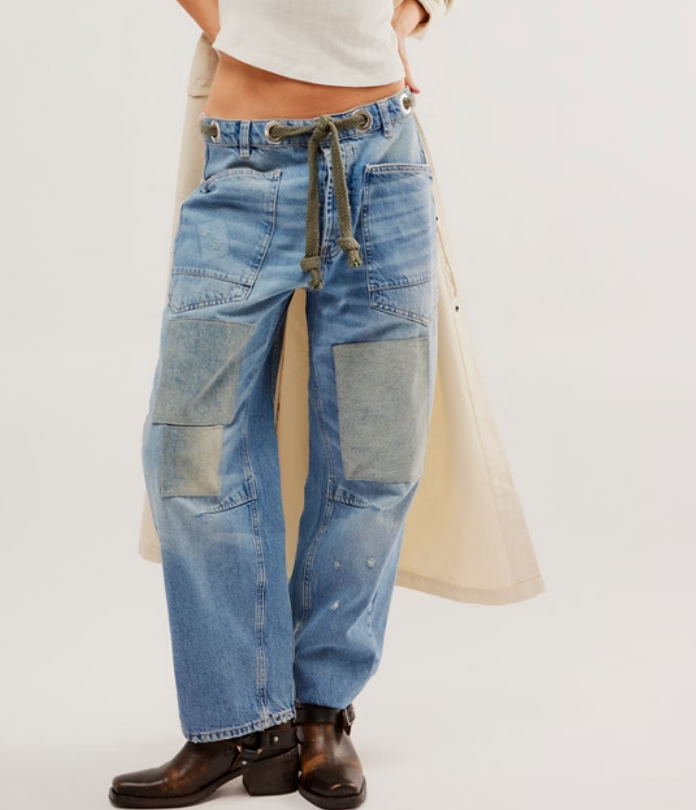 Relaxed barrel-leg patchwork denim pants with oversized utility pockets, contrast panel detailing, and a rope drawstring waistband.