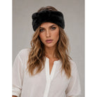 Solid Faux Fur Headwrap in black featuring a plush, soft-textured finish, elegant twisted-front detail, and wide silhouette for a cozy, sophisticated winter look.