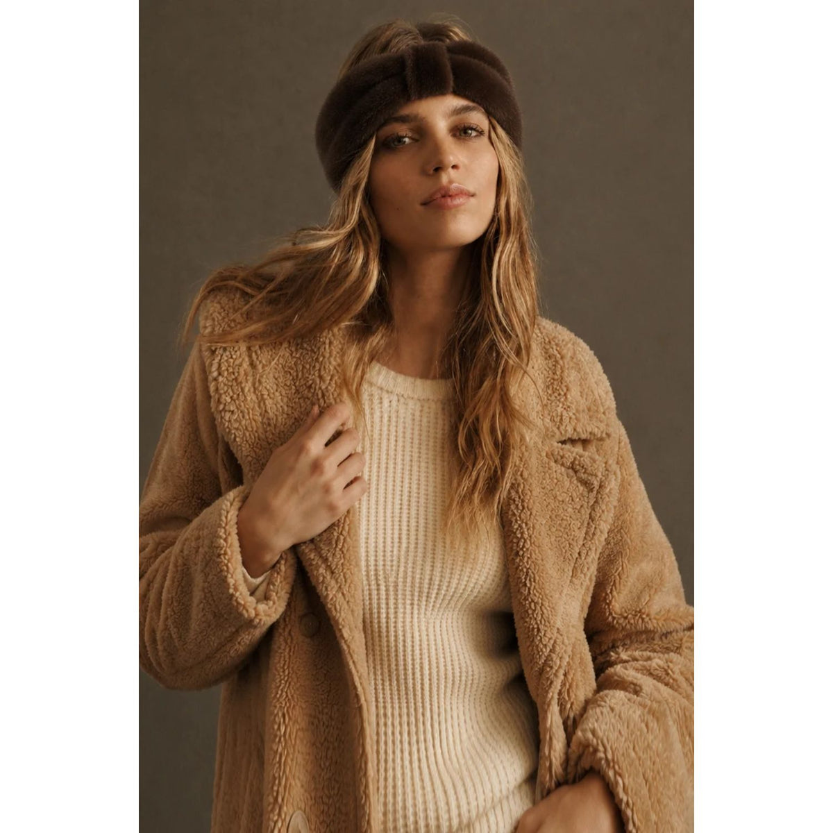 Solid Faux Fur Headwrap in black featuring a plush, soft-textured finish, elegant twisted-front detail, and wide silhouette for a cozy, sophisticated winter look.