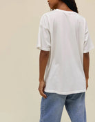 Day Dreamer Time Waits For No One Tee Vintage White. Meant to feel like a true souvenir, featuring a cut and paste collage highlighting some of the Stones’ most signature symbols. Shouting out one of their best tracks ever recorded, this merch tee is marked with “Time Waits for No One."
