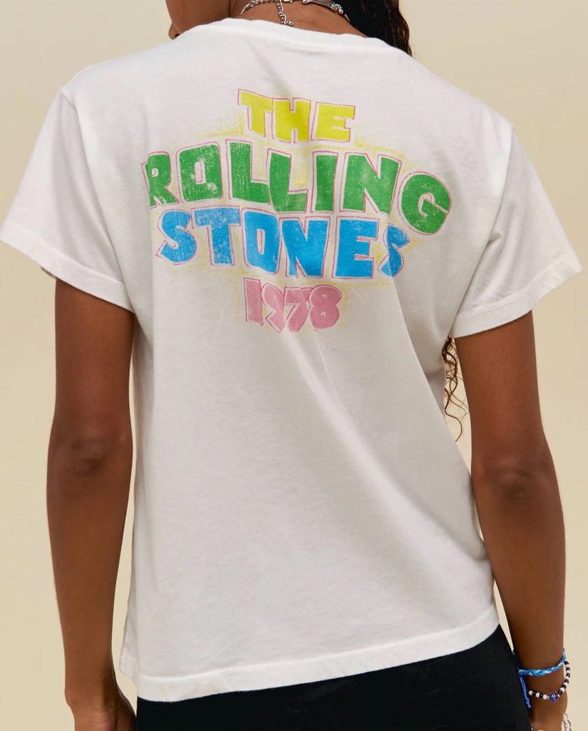 Day Dreamer Rolling Stones 1978 Tee White. A new signature for your Stones’ shuffle. Tributing The Rolling Stones’ triumph of a 1978 American Tour following the release of their album “Some Girls,” is this double-sided and multi-colored graphic featuring the band’s classic hot lips logo.