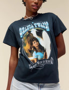 Day Dreamer Shania Twain Tee Vintage Black. The master example of women empowerment lands on a reverse tour tee, bound to stir up some commotion. Featuring a photo of the icon back in her peak.