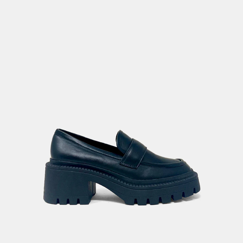 Tahiti Loafer Black. With its chunky high heel, these preppy loafers deliver a playful update to a classic silhouette. This pair is crafted from faux leather and can be easily styled up or down, depending on the occasion.