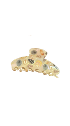 Hair claw clip with an allover shell print design and sturdy interlocking teeth for secure all-day hold.