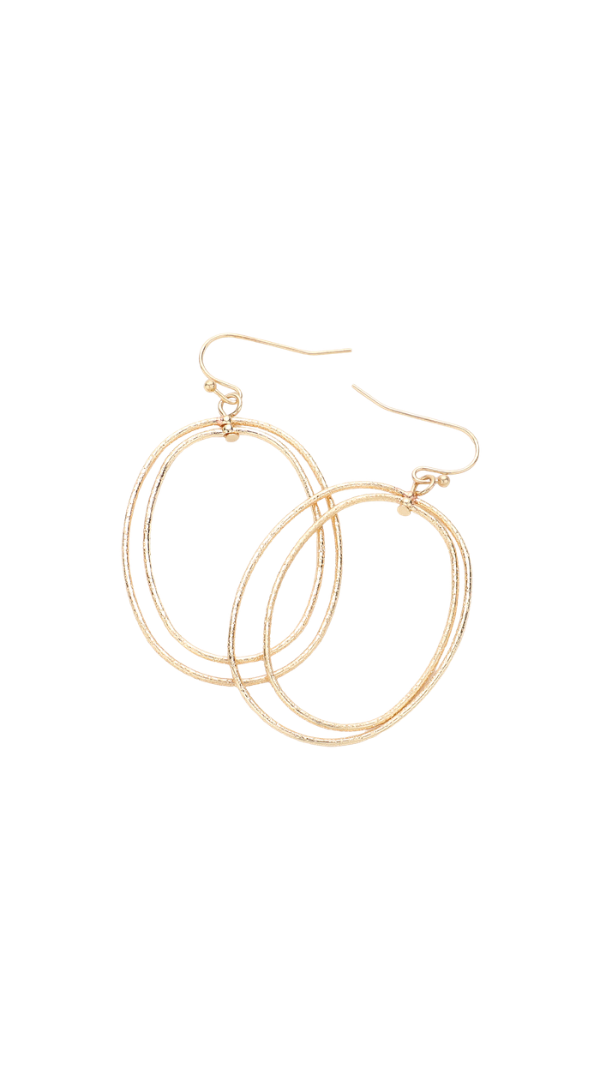 Mixed metal drop earrings with intertwined gold and silver oval hoops.