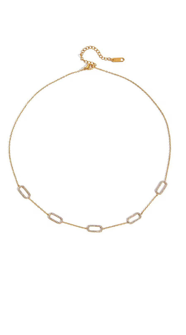 Delicate chain necklace featuring five pavé crystal link accents and an adjustable clasp.