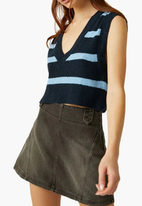 Free People Santa Monica Vest Navy Dusk. Lovely whether layered or starring solo in your look, this sweater-vest is knit from soft, cotton-blend yarns in a cropped silhouette with contrasting stripes.