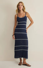 Women's crochet midi dress with spaghetti straps, fitted silhouette, and open-knit stripe detailing.