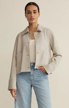 cropped jacket, lightweight jacket, casual jacket, everyday layer, utility jacket, modern jacket, layering piece, chic outerwear, minimalist style, wardrobe staple, transitional jacket, effortless style