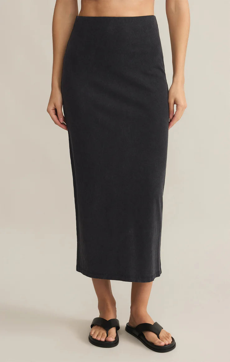 midi skirt, slip skirt, knit skirt, casual skirt, everyday skirt, pull on skirt, comfortable skirt, versatile outfit, minimalist style, chic basics, travel outfit, wardrobe staple, effortless style