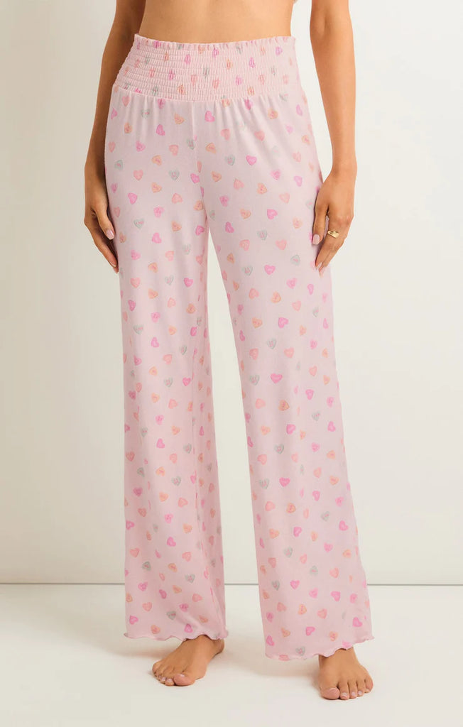 Z Supply Dawn Candy Hearts Pant Whisper Pink. The Dawn Candy Hearts Pant adds a sweet touch to your lounge wardrobe and makes an ultra soft matching set with the Candy Heart Cami.
