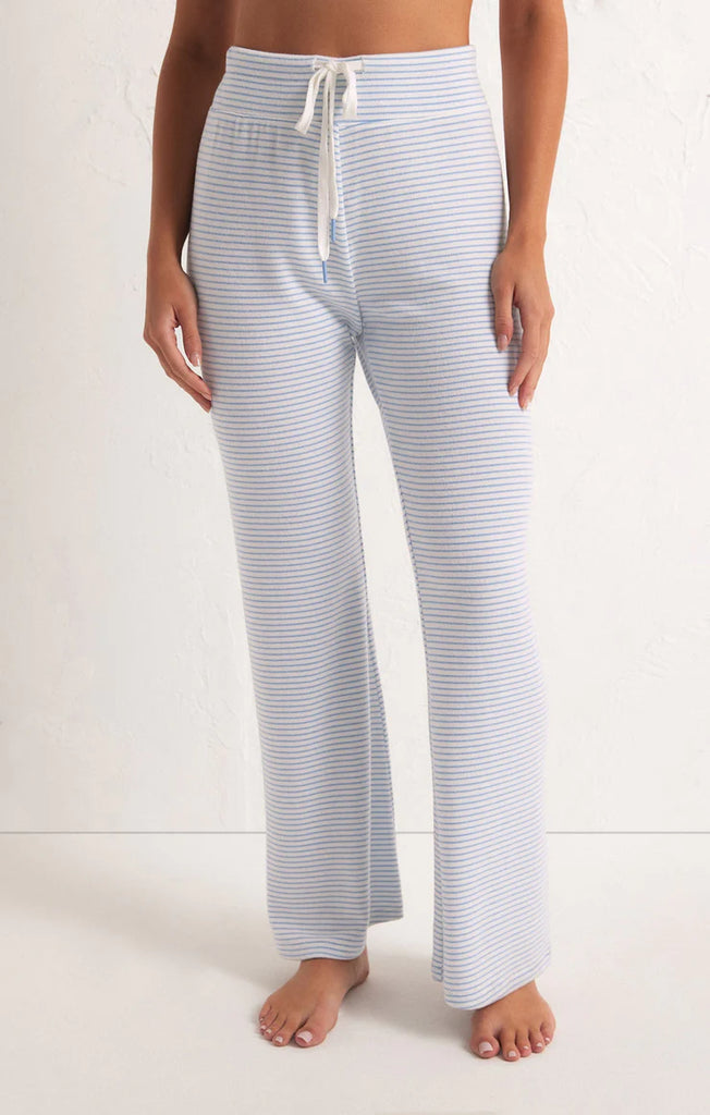 Z Supply In The Clouds Stripe Pant Blue Jay. The In the Clouds Stripe Pant is ultra soft and cozy and destined to become a fave this season. With its slight kick flare, this easy, drawstring pant makes a cute matching set with the Staying In Stripe Long Sleeve Top.
