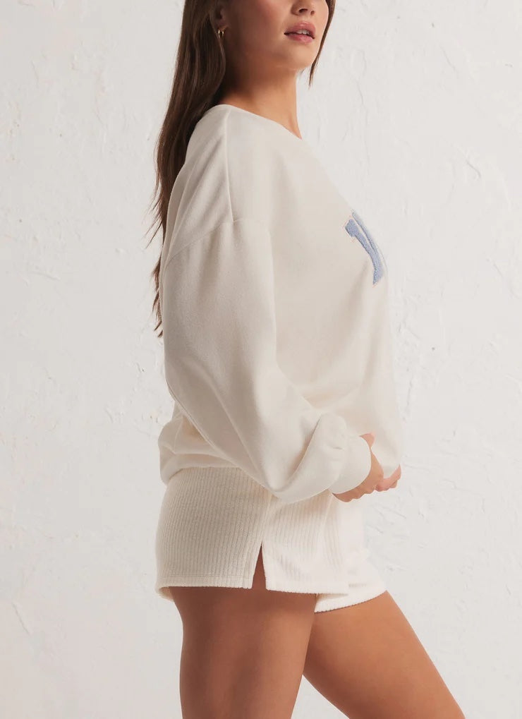 Z Supply Oversized Vacay Sweatshirt White. Planning a vacay? Grab the Oversized Vacay Sweatshirt and stay comfy on your flight or road trip. This classic crew pullover is also perfect for staycations or lounging around the house. Throw it on over denim and this top easily creates a comfy casual look.