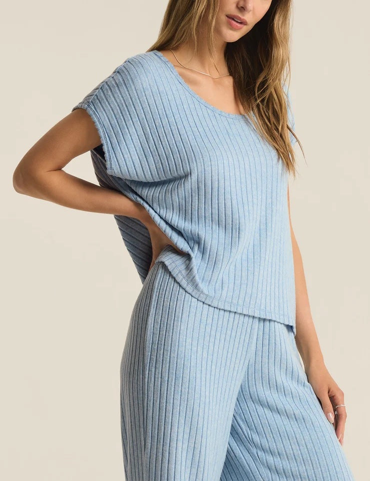 Z Supply Shoreline Rib Top Blue Jay. Dress yourself in the dreamy softness of your new favorite lounge top. The relaxed fit of the Shoreline Rib Top and classic crew neck style make it easy to wear year-round.