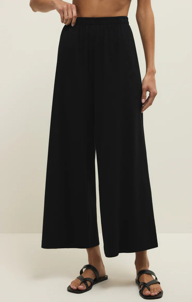 wide leg pants women, relaxed flowy pants, elastic waist pants women, casual chic pants, travel friendly pants, everyday comfort pants, minimalist wide leg trousers, lightweight lounge pants women, effortless style pants, relaxed fit trousers women, versatile wardrobe staple pants, modern casual wide leg pants, easy pull on pants women