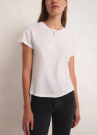 Z Supply Modern Slub Tee White. This Essential tee is a must-have in every closet! This casual wardrobe base-layer essential is great for layering and looks so good with your fave pair of jeans.