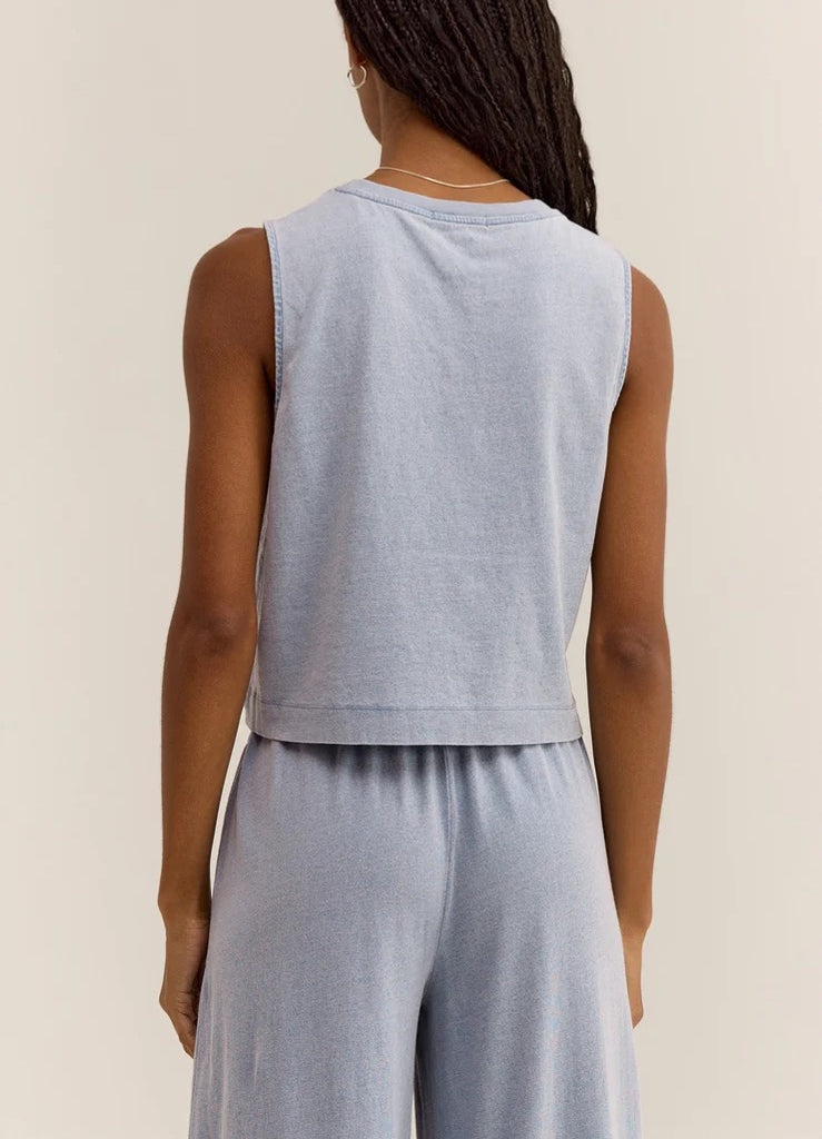 Z Supply Sloane Jersey Denim Muscle Tank Washed Indigo. This knit tank has the denim look you love but with a lightweight, soft feel and hint of stretch. This style will elevate your casual look instantly!