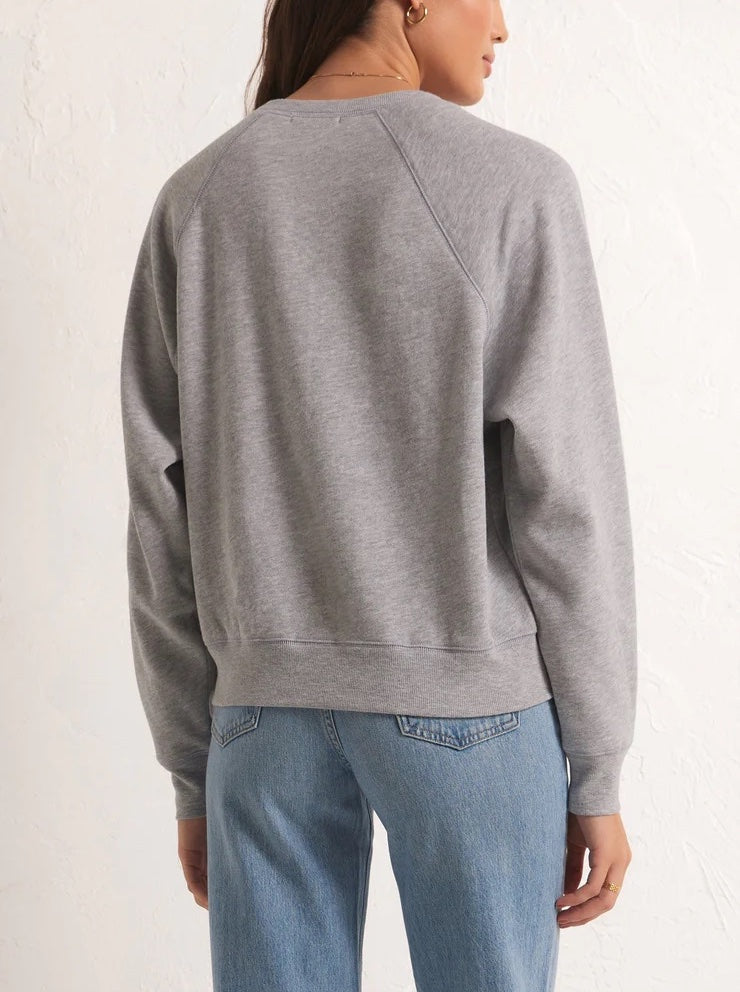 Z Supply NYC Vintage Sweatshirt Heather Grey. Show some love for the Big Apple in this stylishly cozy sweatshirt. The lightweight jersey knit fabric makes this relaxed crew neck pullover easy to wear everyday, no matter the weather.
