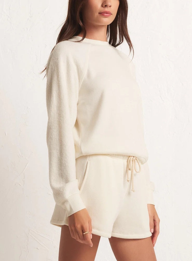 Z Supply Saldana Reverse Fleece Top Sandstone. Prepare to get cozy in the Saldana Reverse Fleece Top. This reverse textured pullover is soft and comfy, making it an easy choice, day after day.