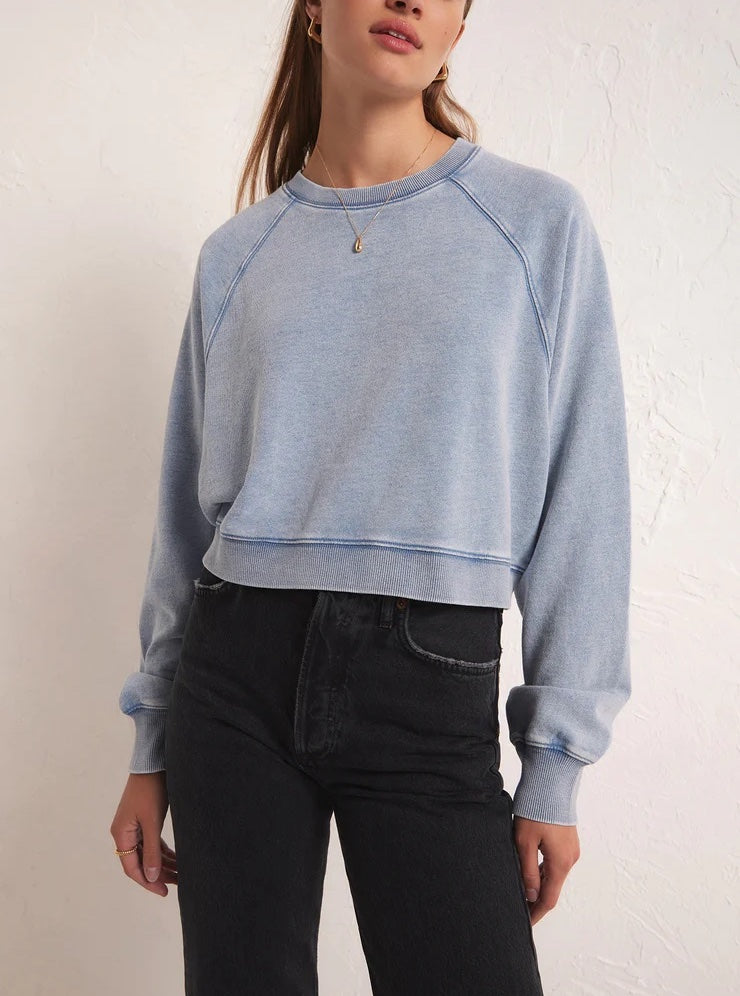 Z Supply Crop Out Knit Sweatshirt Washed Indigo. This knit denim style is so cute, you're gonna love how soft and comfy it is, you'll be living in this cropped pullover, season after season.