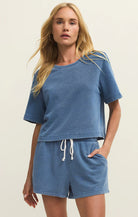 Relaxed short sleeve tee with crew neckline and slightly cropped fit