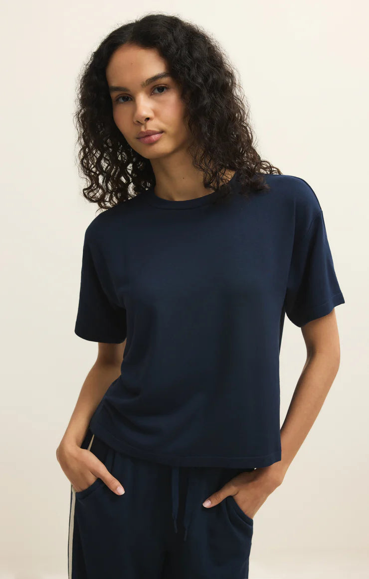 basic tee, everyday t shirt, relaxed fit tee, casual top, elevated basics, soft t shirt, lightweight tee, layering top, wardrobe staple, minimalist style, chic basics, travel outfit, comfy outfit