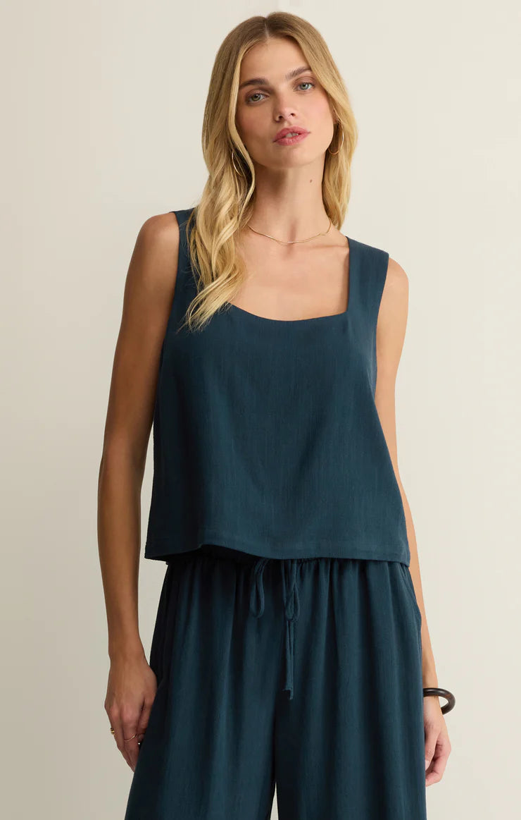 Sleeveless square neck top with relaxed fit styled with matching wide leg pants
