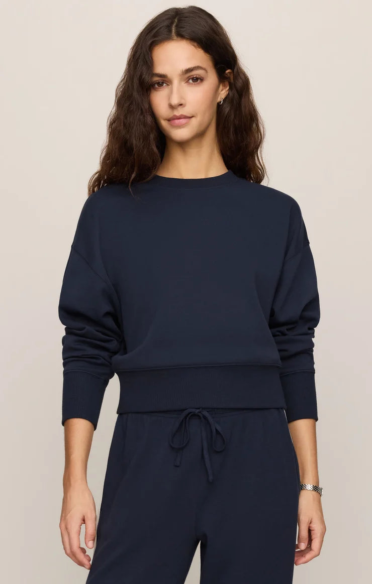 Relaxed crewneck sweatshirt with dropped shoulders, long sleeves, and ribbed trim.