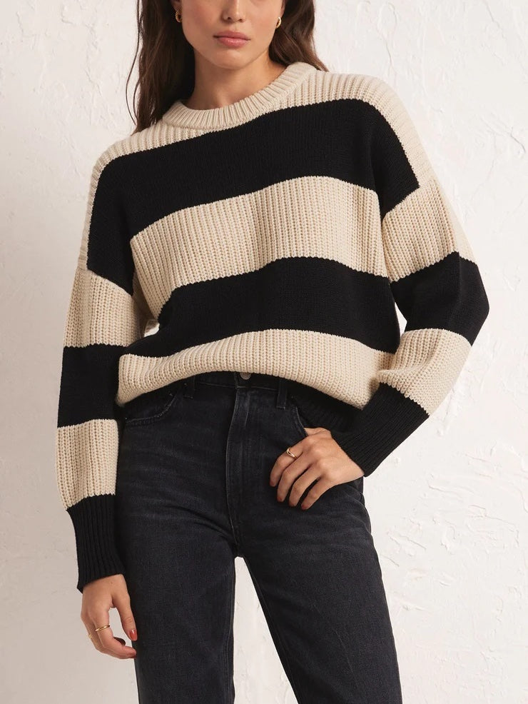 Z Supply Fresca Stripe Sweater Black Beige. The Fresca Stripe Sweater features a timeless wide yarn dye stripe design. Wear it tucked or untucked, this pullover is a versatile statement style you'll enjoy wearing year-round.