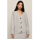 Cozy Moment Cardigan with V-neckline, button front, long sleeves, and oversized patch pockets