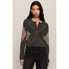 Medina Stripe Cardigan with crew neckline, long sleeves, and button-front closure.