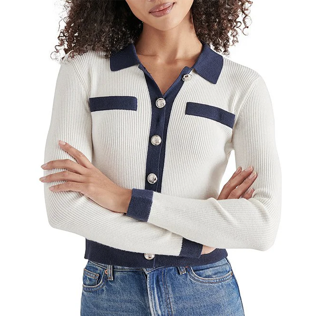 The Ayda Rib Knit Point Collar Long Sleeve Button-Front Cardigan combines comfort and style effortlessly. It features a chic point collar and button-front design. Perfect for layering, this cozy cardigan adds a sophisticated touch to any outfit.